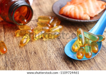fish oil capsules with fresh fish