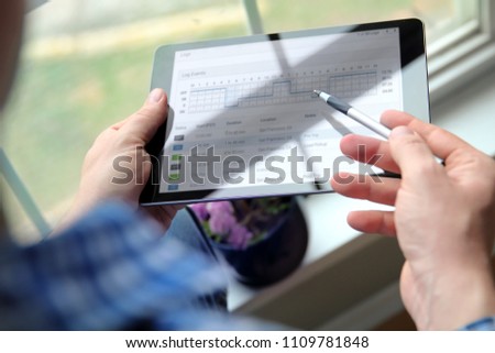 driver writing electronic  log books Royalty-Free Stock Photo #1109781848