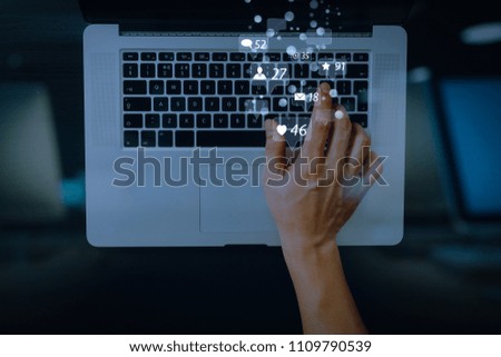 Social media and Marketing virtual icons screen concept.top view of businessman typing keyboard with laptop computer on wooden desk in modern office 