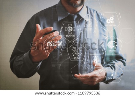 Machine learning technology diagram with artificial intelligence (AI),neural network,automation,data mining in VR screen.success businessman open his hand,working touch screen computer,front view.