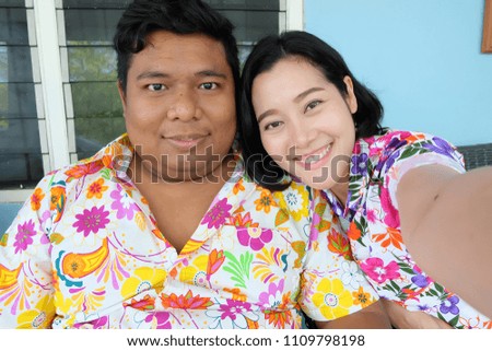 selfie Asian couple,making selfie on camera