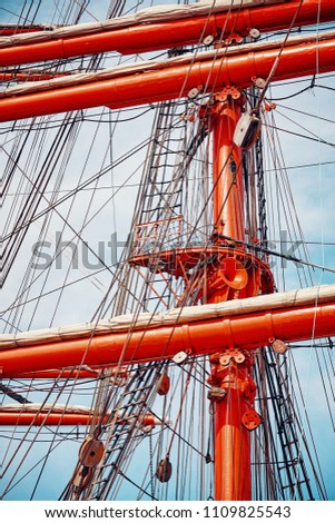 Old sailing ship mast details, color toned picture.