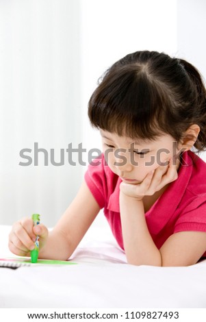 girl drawing a picture