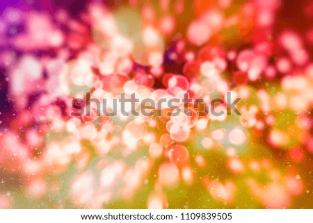 With Natural Bokeh And Bright Golden Lights. Vintage Magic Background With Color Festive background with natural bokeh and bright golden lights. Vintage Magic background with colorful bokeh. 