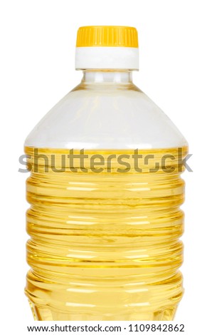 vegetable or sunflower oil in plastic bottle isolated on white background.
