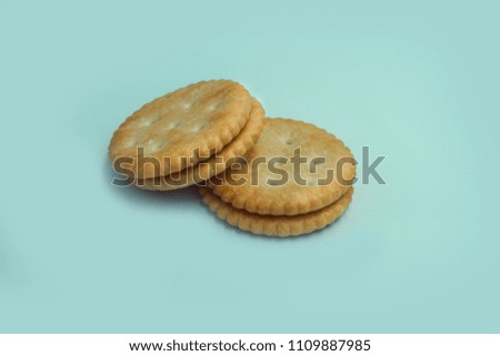 cracker cookies on soft blue pastel background