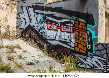 Street art in Baku. Art under ground. Beautiful street art graffiti style. Modern iconic urban culture of street youth. Abstract stylish picture on wall. 