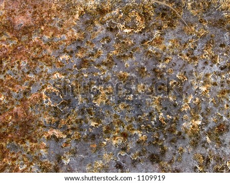 Stock macro photo of the texture of discolored concrete.  Useful for abstract backgrounds and layer masks.