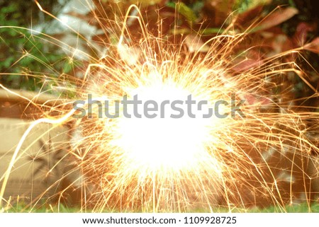 A picture of spark caused by fire cracker taken at night
