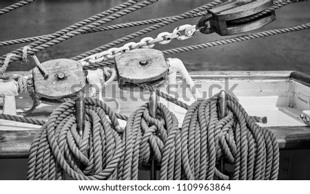 Black and white picture of old sailing boat rigging.