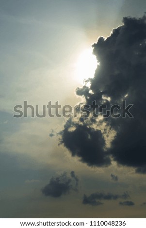Background for design, sky texture with gray clouds at sunset or sunrise