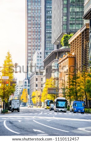 Asia Business concept for real estate and corporate construction - view of modern city skyline and business street at morning sky, the city life in tokyo, japan