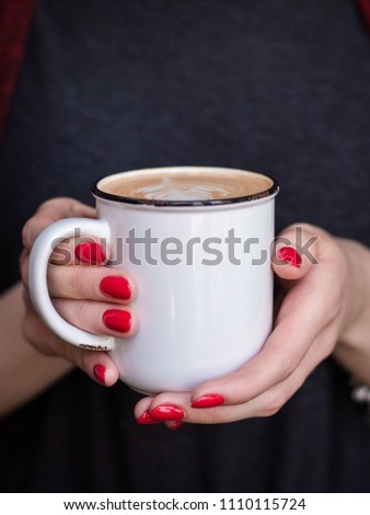 Woman holds white mug in hands. Design Mockup for holidays, banners, logos