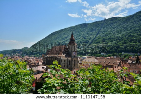 Black Church seen from After the Walls alley, medieval vestiges in Old Town of Brasov, Romania.
