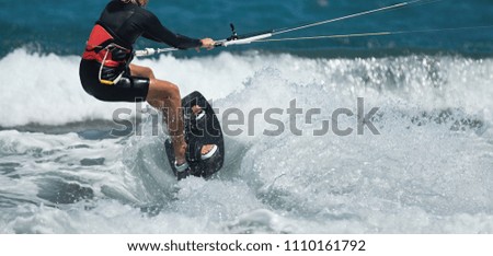 Kitesurfing Kiteboarding action photos,kite surfer rides the waves