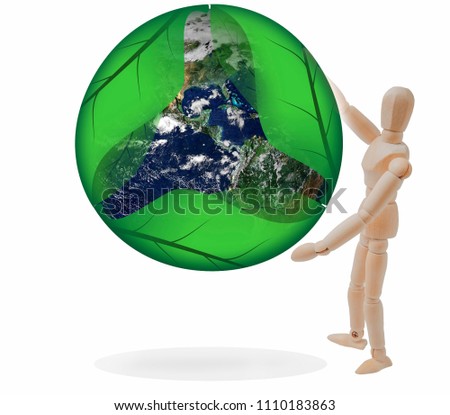 Wooden puppet and energy saving world concept, Elements of this image furnished by NASA.