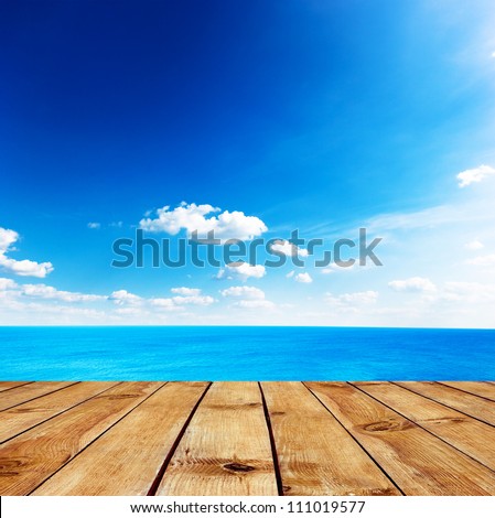 Beauty seascape under blue clouds sky. View from pier