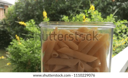 Italian Raw Pasta "Penne" ready to be Cooked