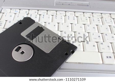 Floppy disk and laptop