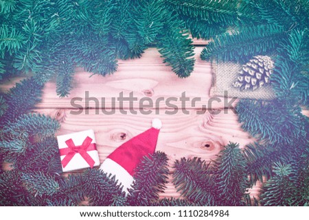 christmas gift. Xmas gifts on wooden background. christmas presents with Fir tree branches. Xmas greeting card and border with copy space
