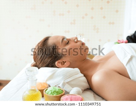 Beautiful woman lying in spa salon, Woman relaxing and lying in spa girl, Health care concept.