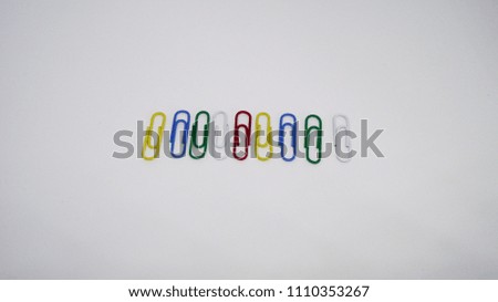Colorful paper clip with white background
