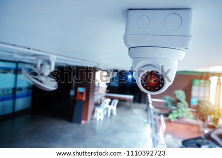Security CCTV camera at the ceiling in area under of condominium.Anti-theft system and help create peace of mind.Digital eyes. Photography and video recording.Surveillance.Infrared