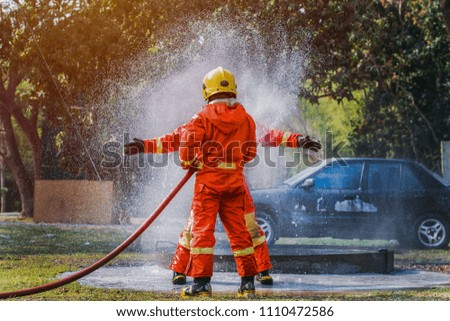 Fireman from Fire Department show some sample of water nozzle that been use for extinguish fire.