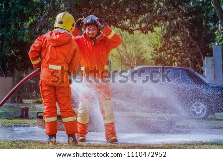 Firefighters show how to use water