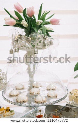 cupcakes with beautiful decoration isolated over white background. shoot from top