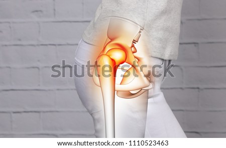 Woman suffering from hip joint pain Royalty-Free Stock Photo #1110523463