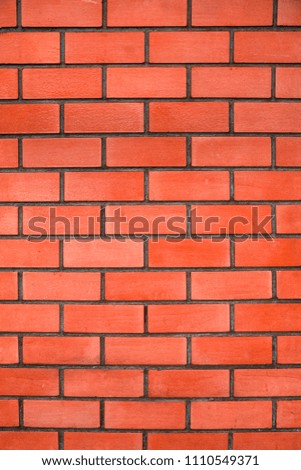 Square red brick block wall use as background and texture