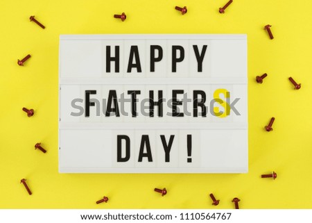 Happy Fathers Day, Father's lightbox message on yellow background. Greeting card concept