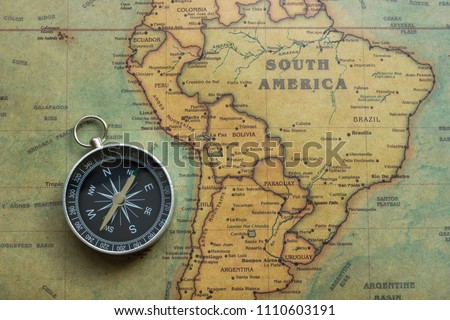 vintage map south america and compas, close-up Royalty-Free Stock Photo #1110603191