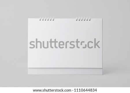 Blank paper spiral calendar for mockup template advertising and branding background.  