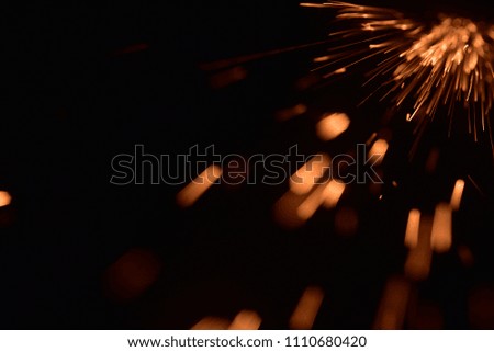  fire with sparks on a black background