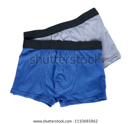 Underpants and clothing for kids isolated on white background. Royalty-Free Stock Photo #1110685862