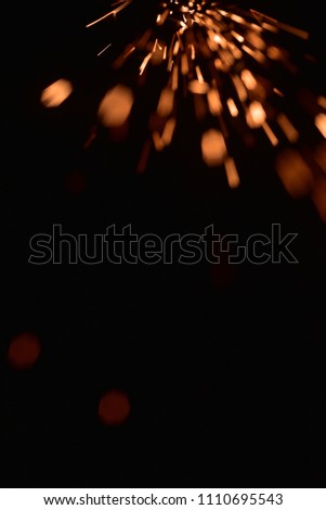  fire with sparks on a black background