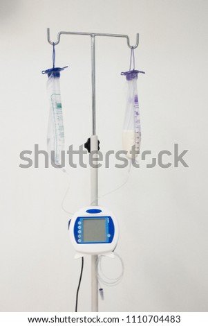  ePump Enteral Feeding Pump with dual feeding bags on double hook iv stand Royalty-Free Stock Photo #1110704483