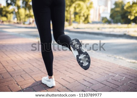 Photo of inflated, and sports female legs, Jogging, can be used for advertising,