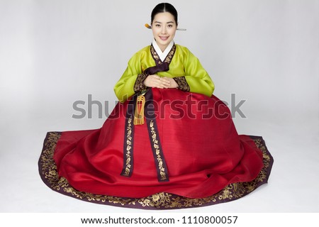 young woman in korean traditional clothing, hanbok Royalty-Free Stock Photo #1110800057