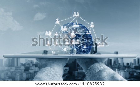 Networking and communication technology. Hand holding digital tablet and network global connection technology. Element of this image are furnished by NASA
