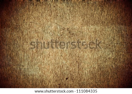 old dirty cracked grungy background texture in brown