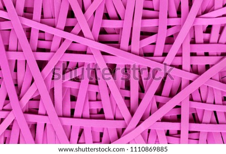 Close view small rubber bands on a white background