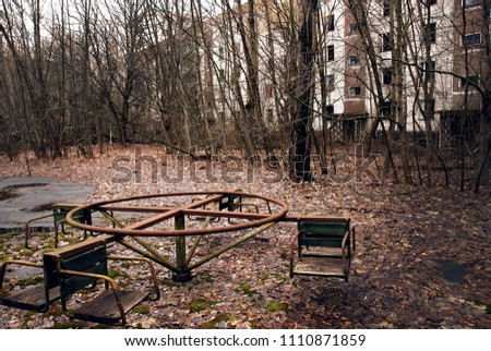 Children's carousel, abandoned in Pripyat. Chernobyl, a catastrophe. Ruined city. Lost house Royalty-Free Stock Photo #1110871859