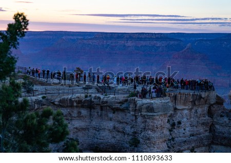 People are looking sunset at Grand canyon