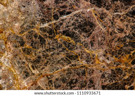 Granite texture - design lines natural stone abstract surface grain rock background construction closeup details
