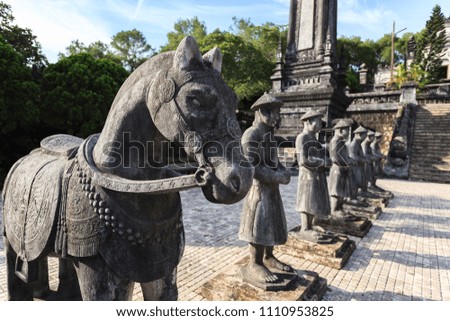 Tomb of Khai Dinh with Mandarin Honour Guard in the Honour Courtyard. Statues in line at the Khai Dinh tomb in Hue, Vietnam Royalty-Free Stock Photo #1110953825