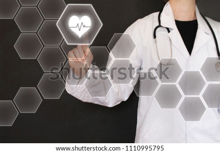 Female doctor touching virtual hexagon buttons with icons
