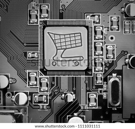 Macro photo of circuit board with shopping cart on the chip surface